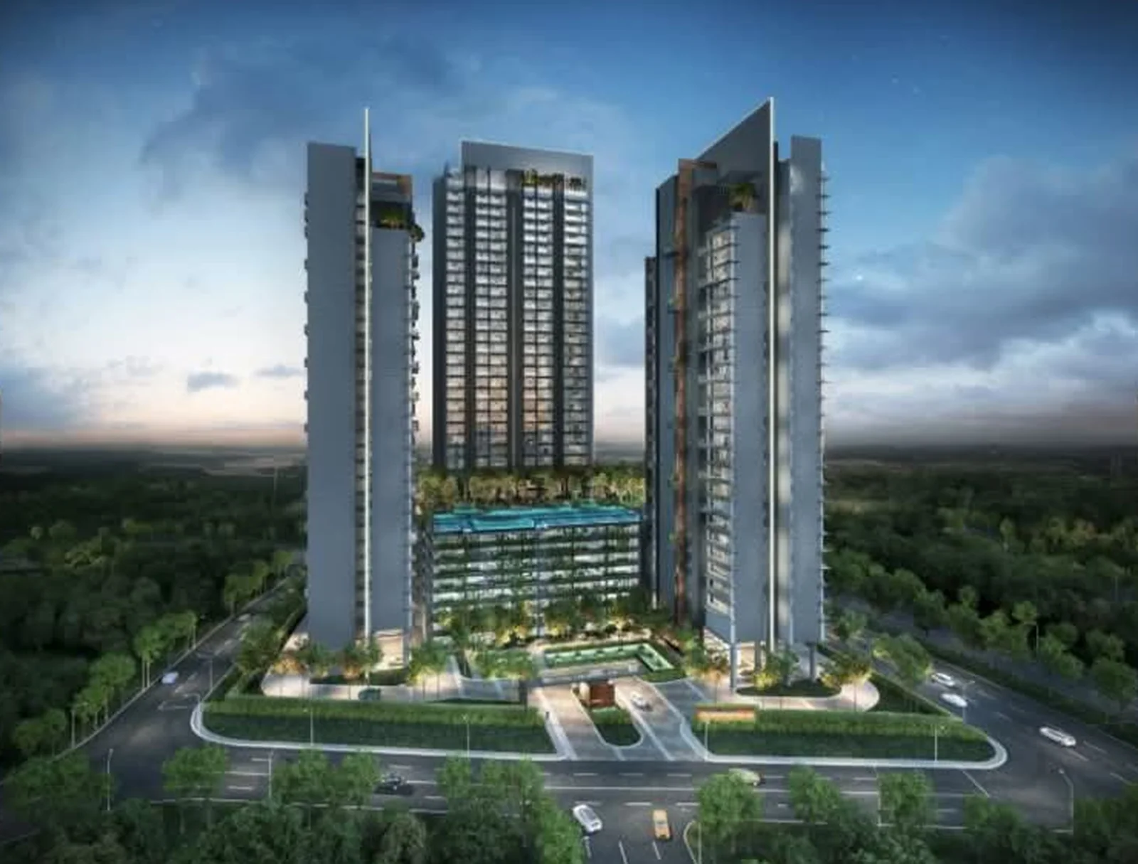 Grand Medini's twin residential towers at dusk in Medini Iskandar Malaysia, pool deck lit between the towers, surrounded by greenery